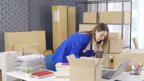 Entrepreneurial-business-woman-is-packing-cargo.